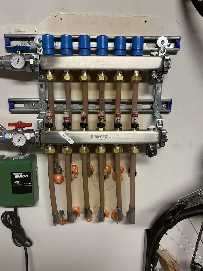 Plumber performing Leak Detection at a residential property in West Brookfield